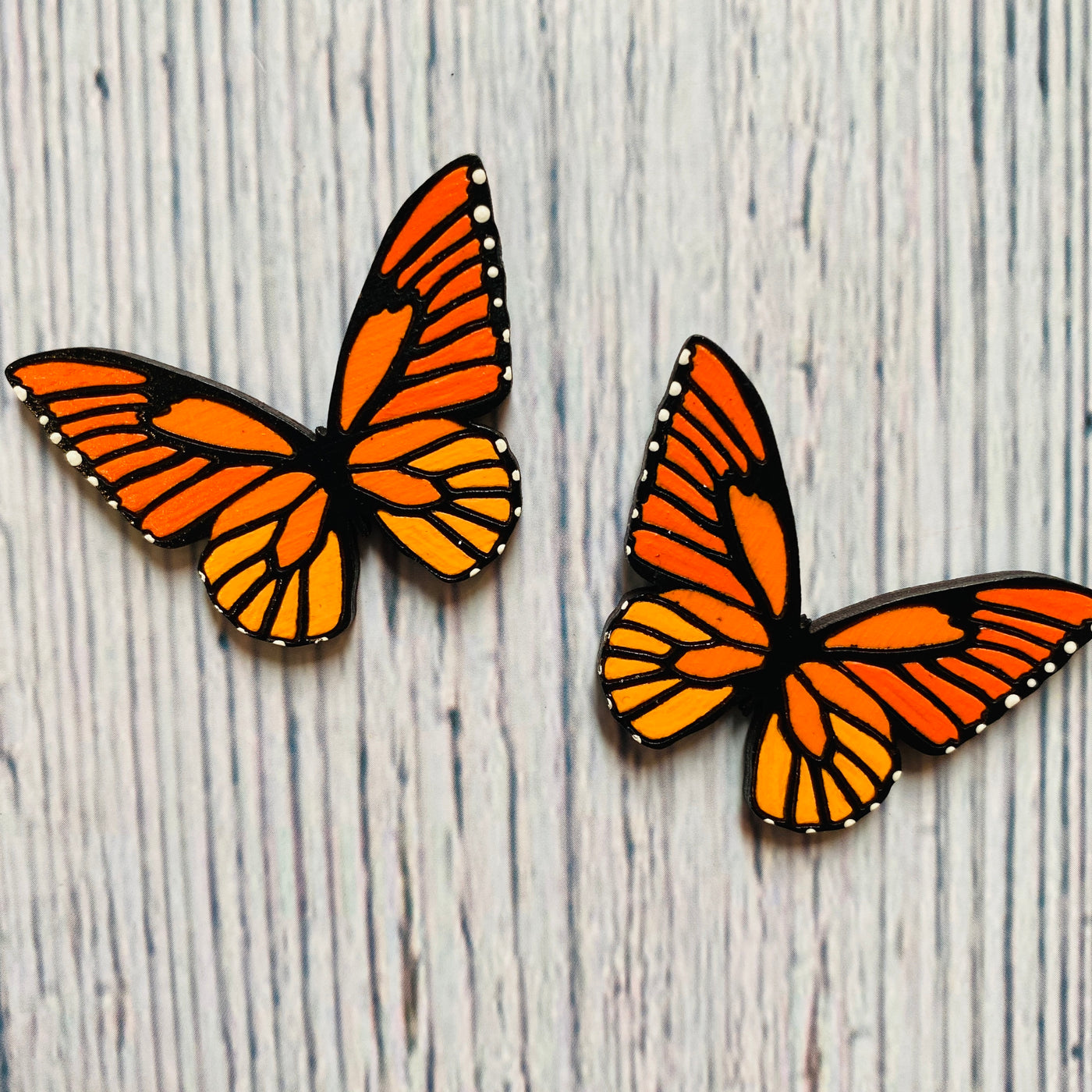 Large laser cut wood monarch butterfly stud earrings. 