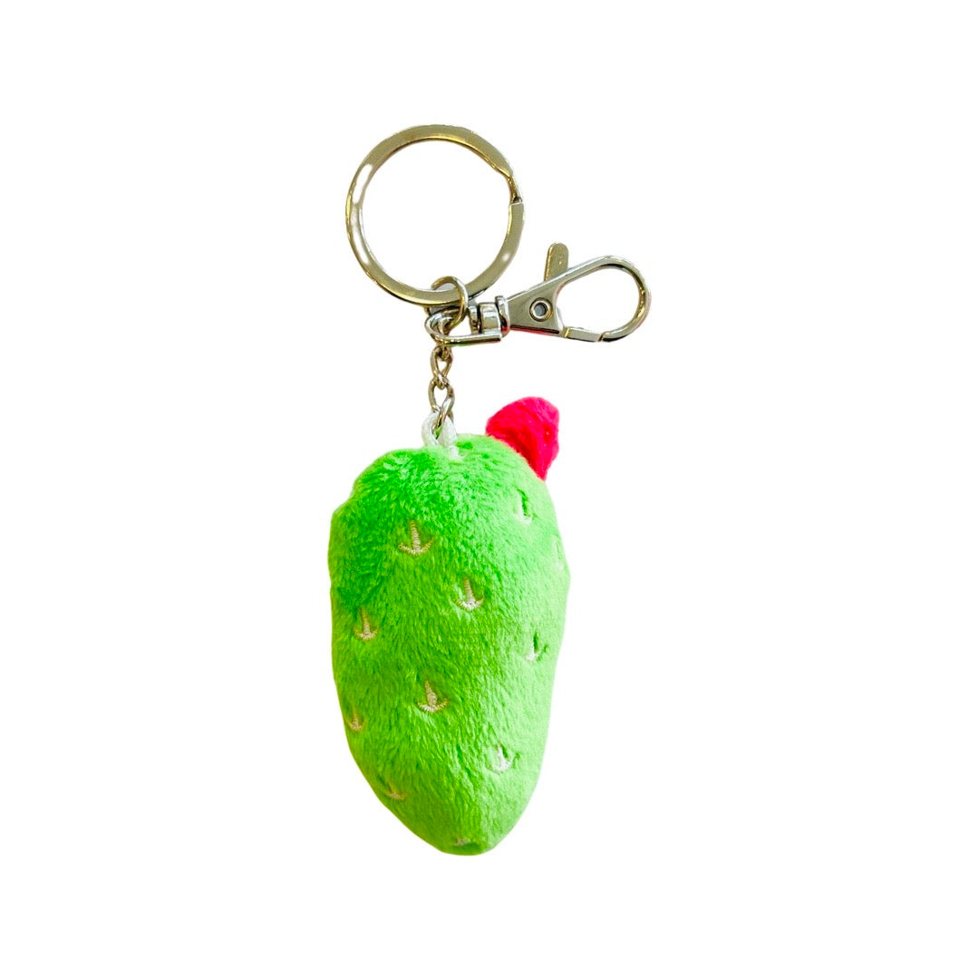 Small plush green cactus on a keychain. 