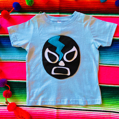 Top view of hand-stitched Luchador kids's blue t-shirt.