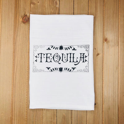 Top view of Tequila Kitchen Towel pictured on wooden table.
