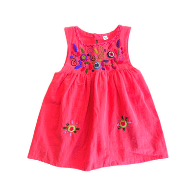 Coral colored child's dress with multi-colored floral embroidery