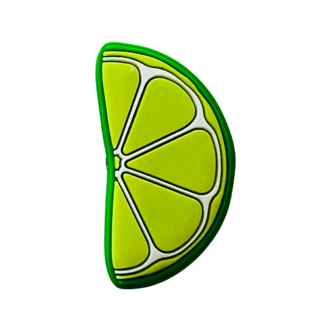 A single green lime wedge croc charm.