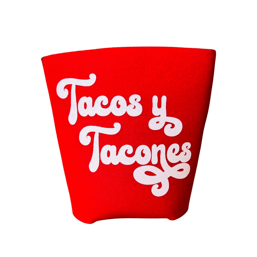 "Tacos y Tacones" phrase can cooler in red with white lettering.
