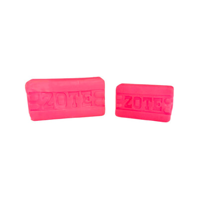a set of pink zote soap dog toy with one smaller then the other
