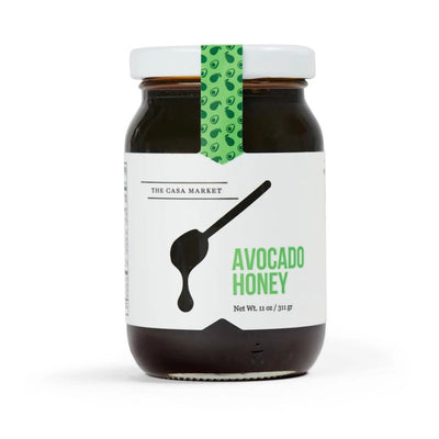 Avocado Honey in branded glass jar with lid. 