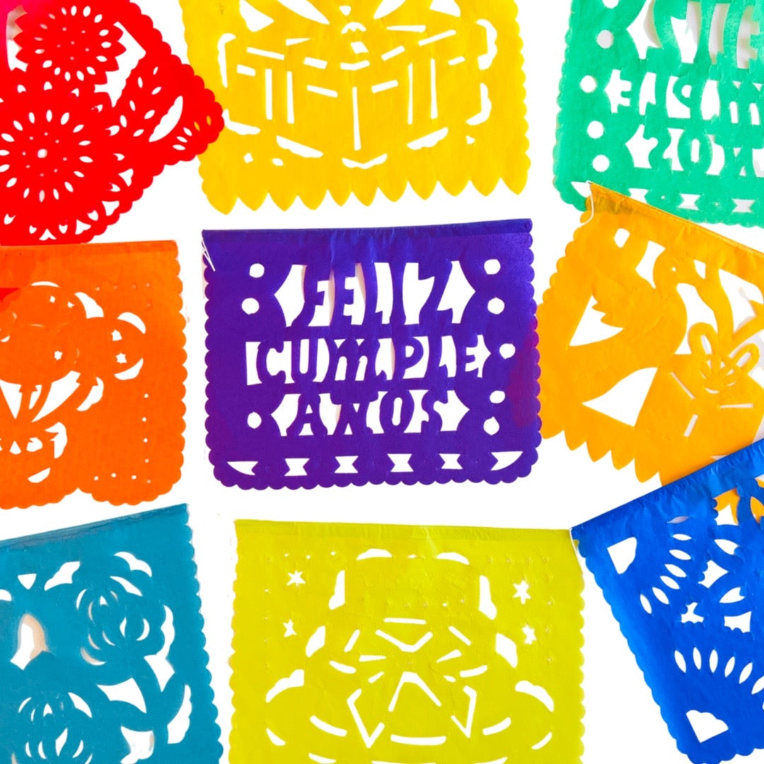 Feliz Cumpleanos papel picado banner of various colors and various party related designs. Papel picado , or perforated paper, is a traditional Mexican decorative craft made by cutting elaborate designs into sheets of tissue paper.