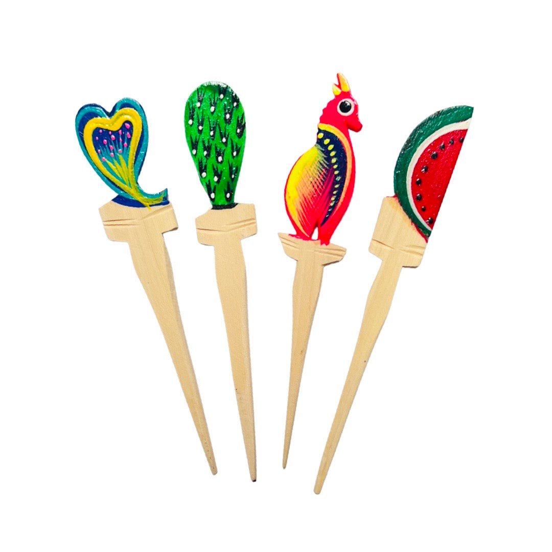Colorful Oaxacan Painted Wooden Toothpicks. From left to right, design features: peacock feather, cactus, bird, and watermelon slice. 