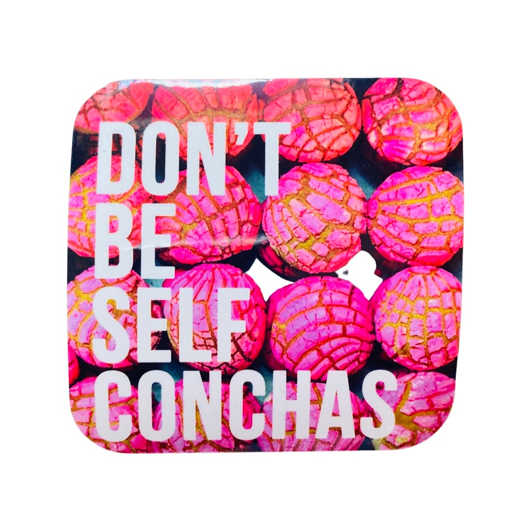 Stickers reads, "Don't be self conchas," with pink conchas in the background.
