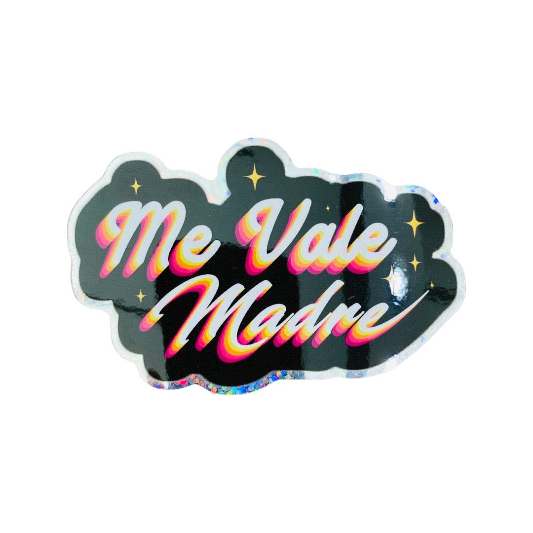 Me Vale Madre (I don't care) phrase sticker. Multicolored cursive lettering with black background and stars.