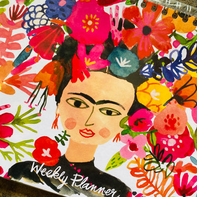 Close up of floral Frida Kahlo weekly planner.