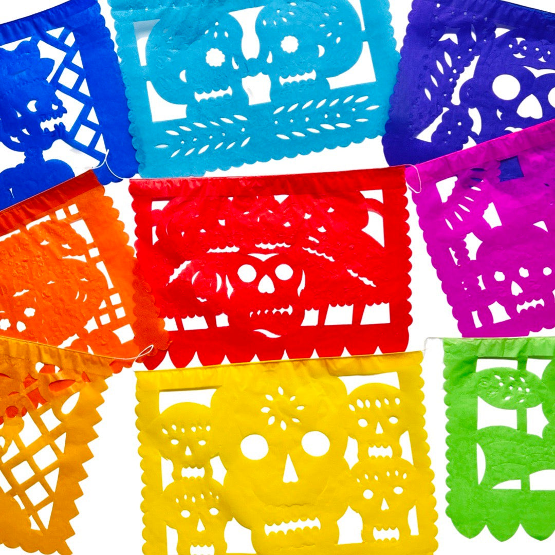 A papel picado banner of various colors and various skeleton designs. Papel picado , or perforated paper, is a traditional Mexican decorative craft made by cutting elaborate designs into sheets of tissue paper.