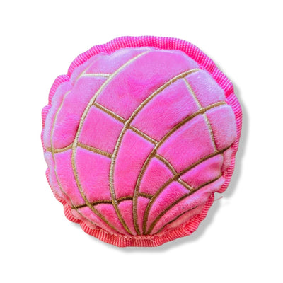 Pink round concha (sweet bread) dog toy.