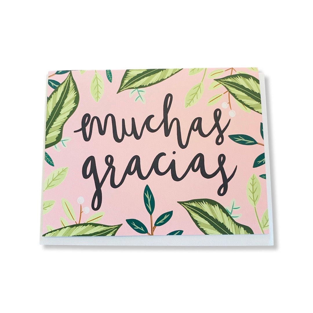 Muchas Gracias greeting card with green plants design.