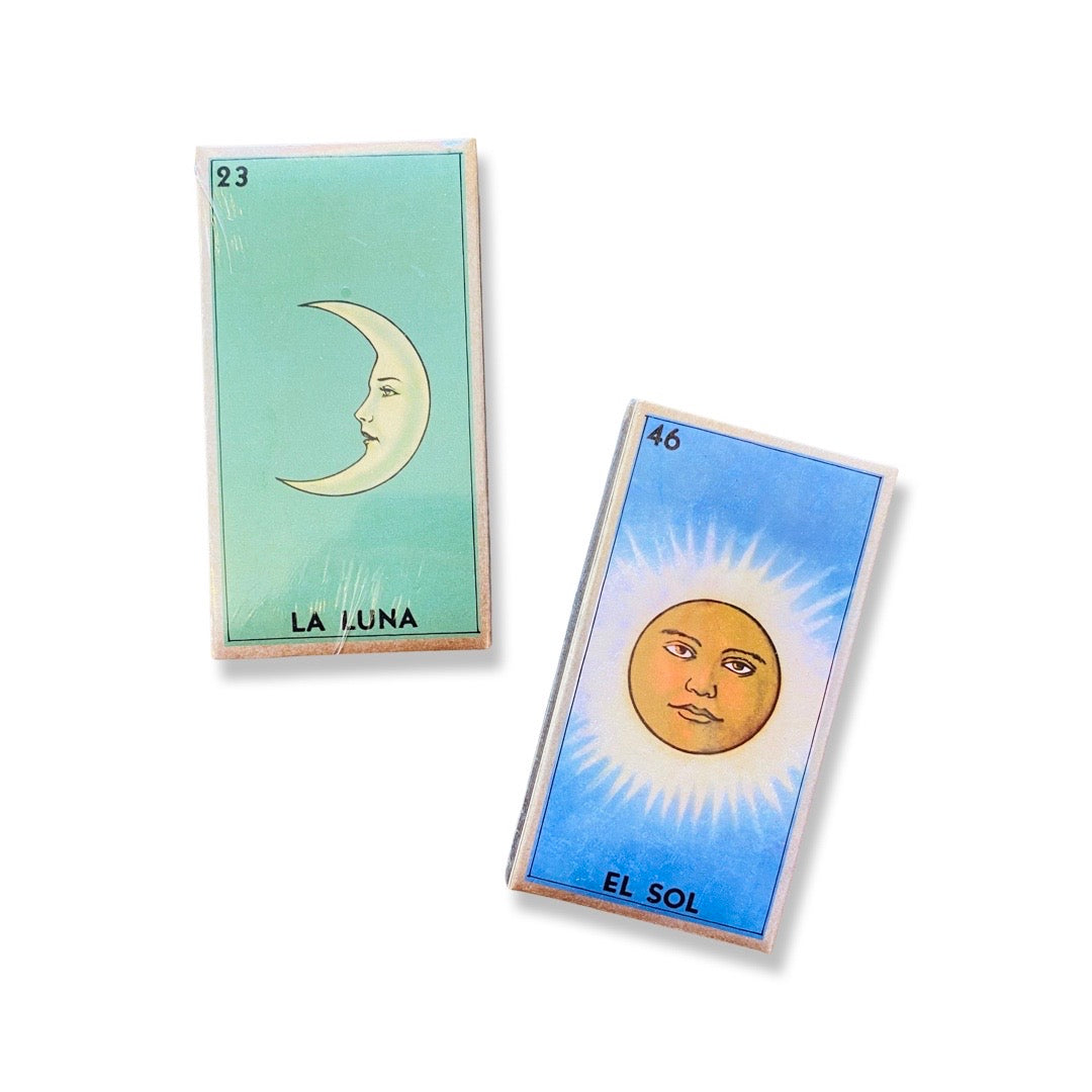 Set of matches with one box having a La Luna image and the other having El Sol image