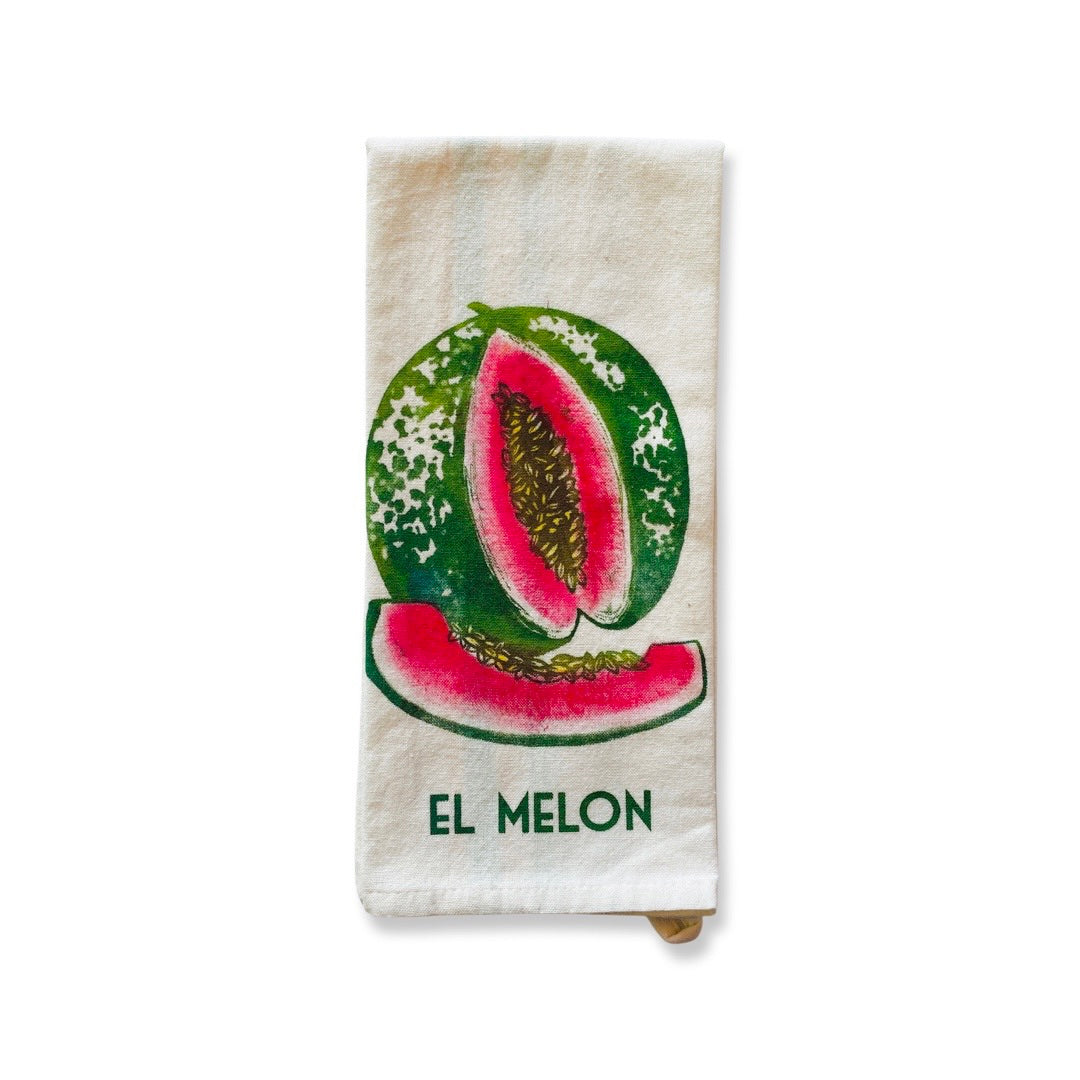 Loteria dish towel featuring el melon design and phrase.