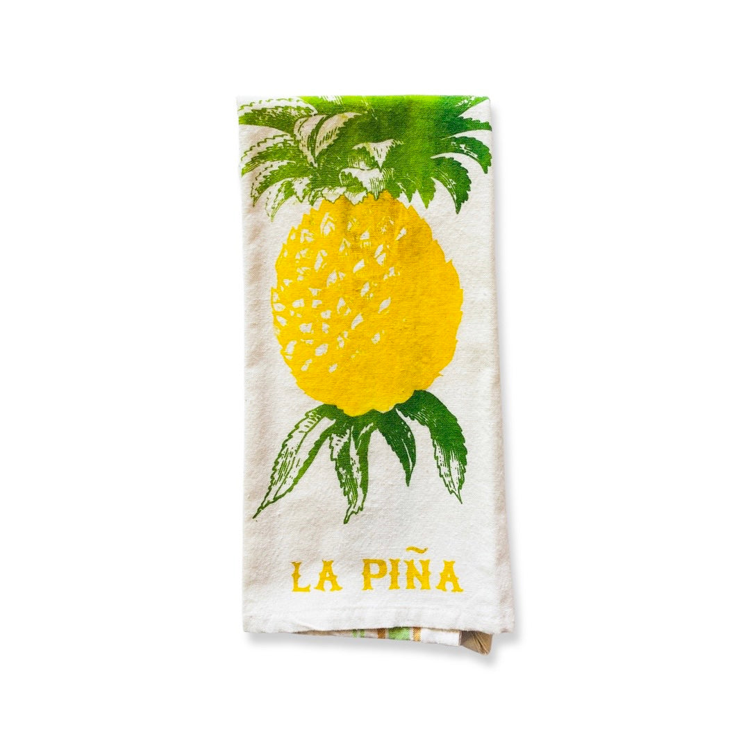 Loteria dish towel featuring La Piña (pineapple) image and phrase.