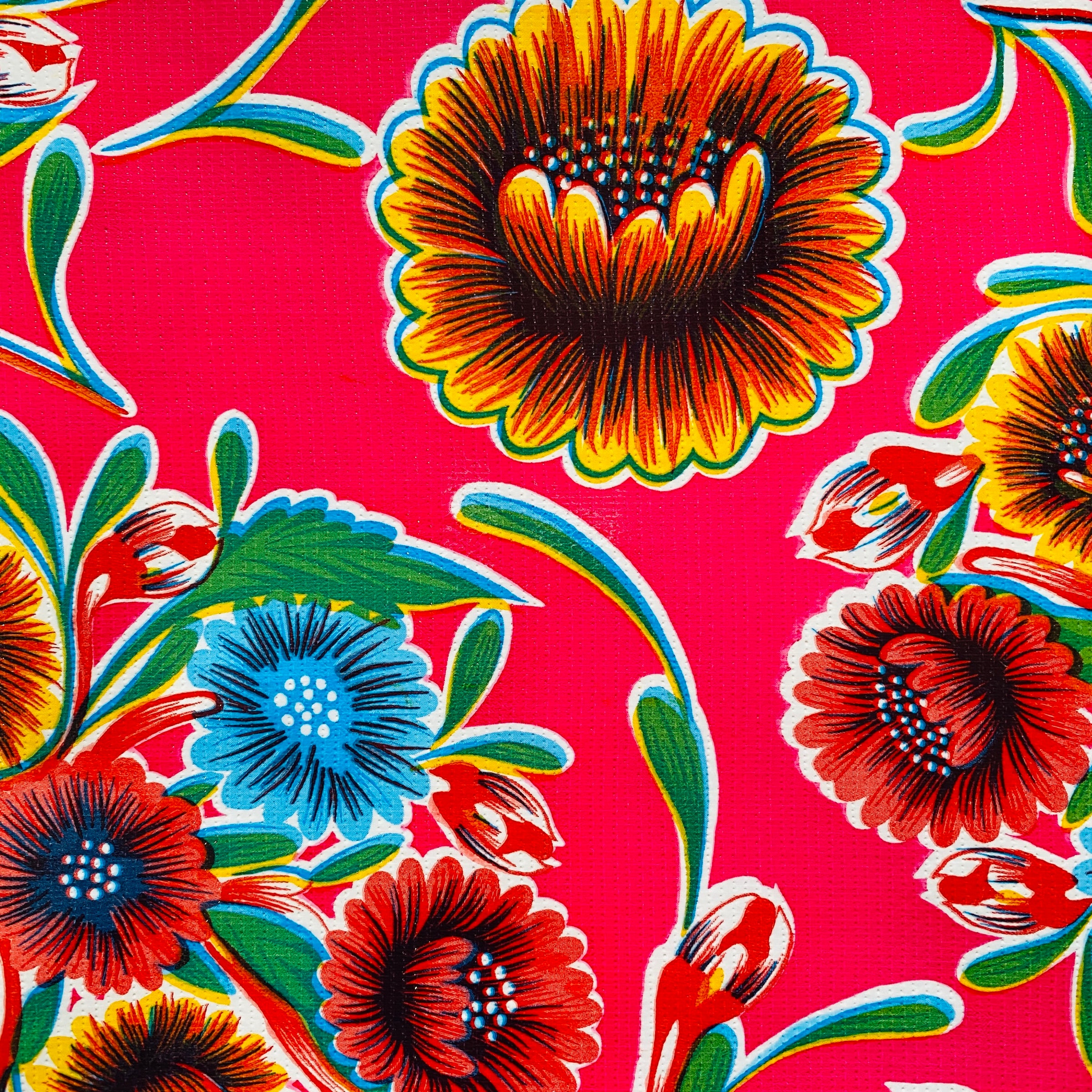 Pink bloom oilcloth table cover. Design features colorful floral design. 