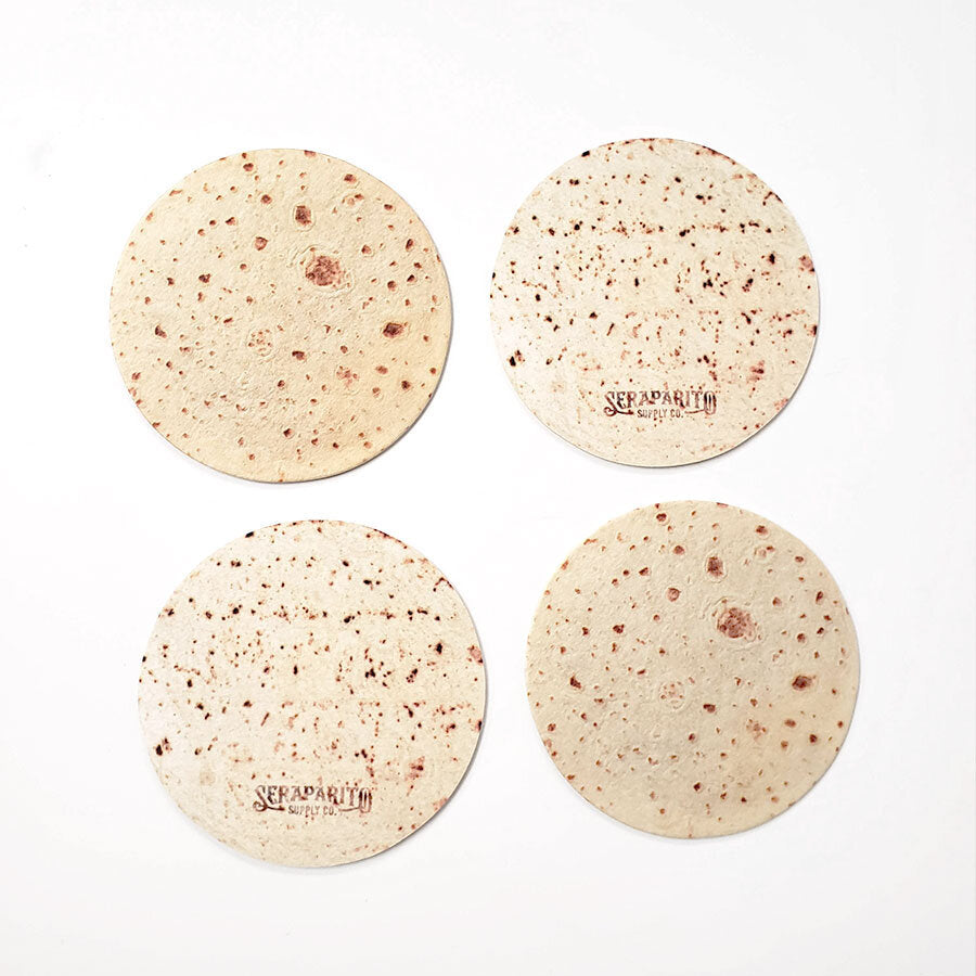 Top view of four tortilla coasters. 