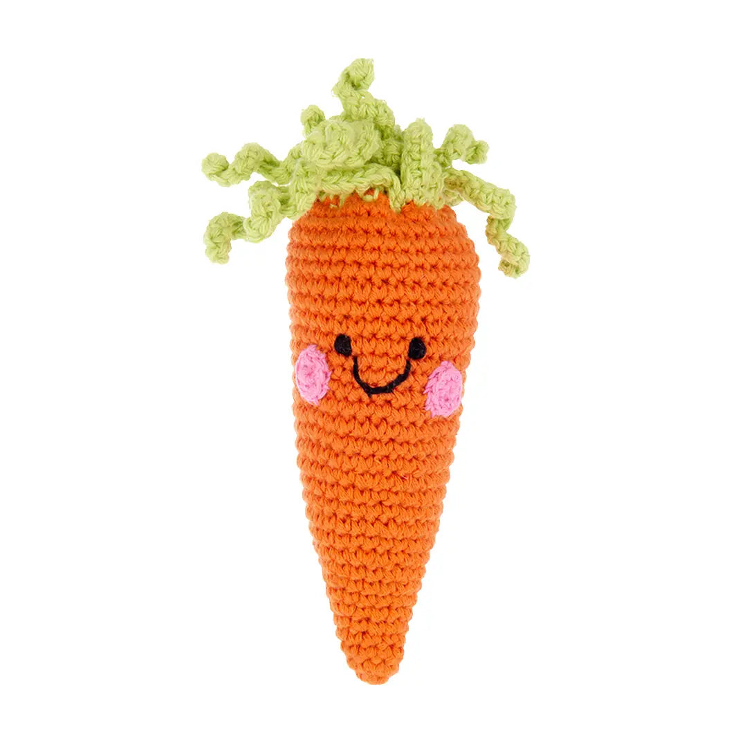 Orange crotchet carrot with a green top and features a smiley face.