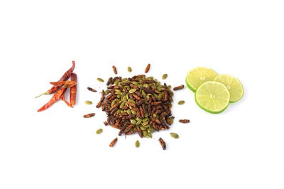 Pictured left from right: dried chile peppers, pumpkin seeds mixed with crickets, and limes.