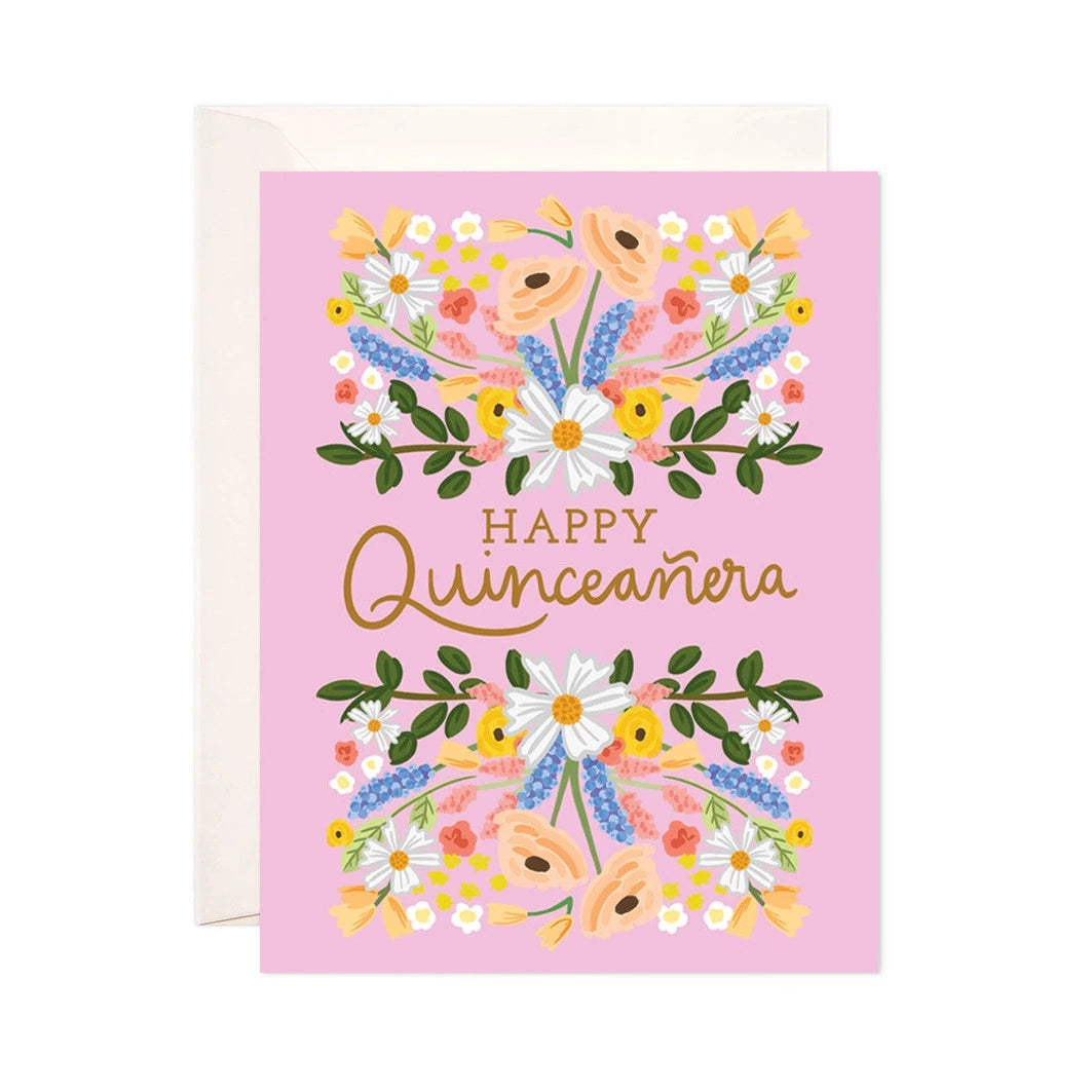 Card with the phrase Happy Quinceanera in the central with floral above and below it.