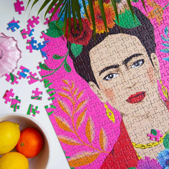 Photo of Frida Kahlo puzzle partially assembled.