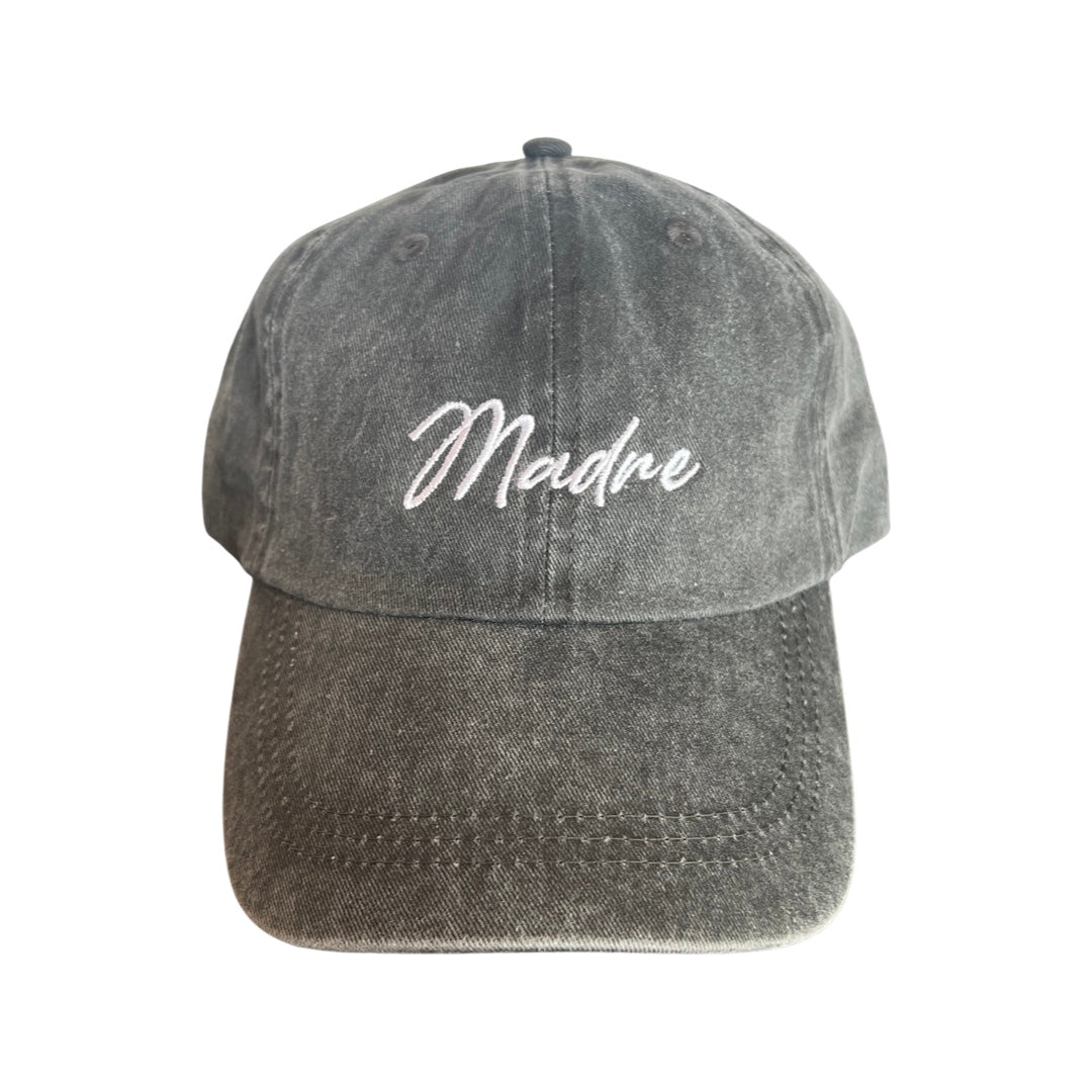 Heathered black hat with the word Madre in white lettering