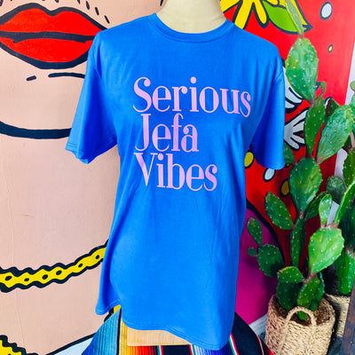 Royal Blue, "Serious Jefa Vibes" t-shirt with pink lettering on mannequin. 