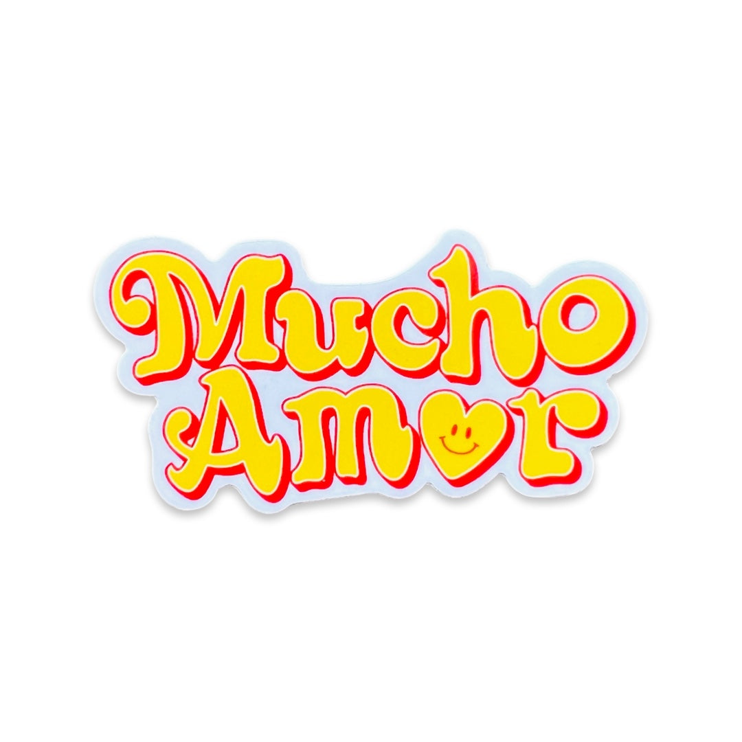 White sticker with  phrase Mucho Amor in yellow lettering outlined by red.