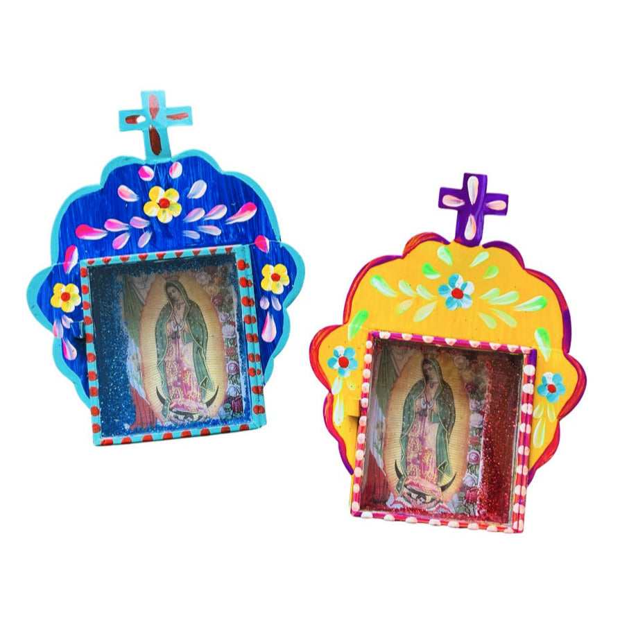 Set of tin, one blue and one yellow, hand painted Virgin of Guadalupe keepsake shadow boxes featuring a cross.