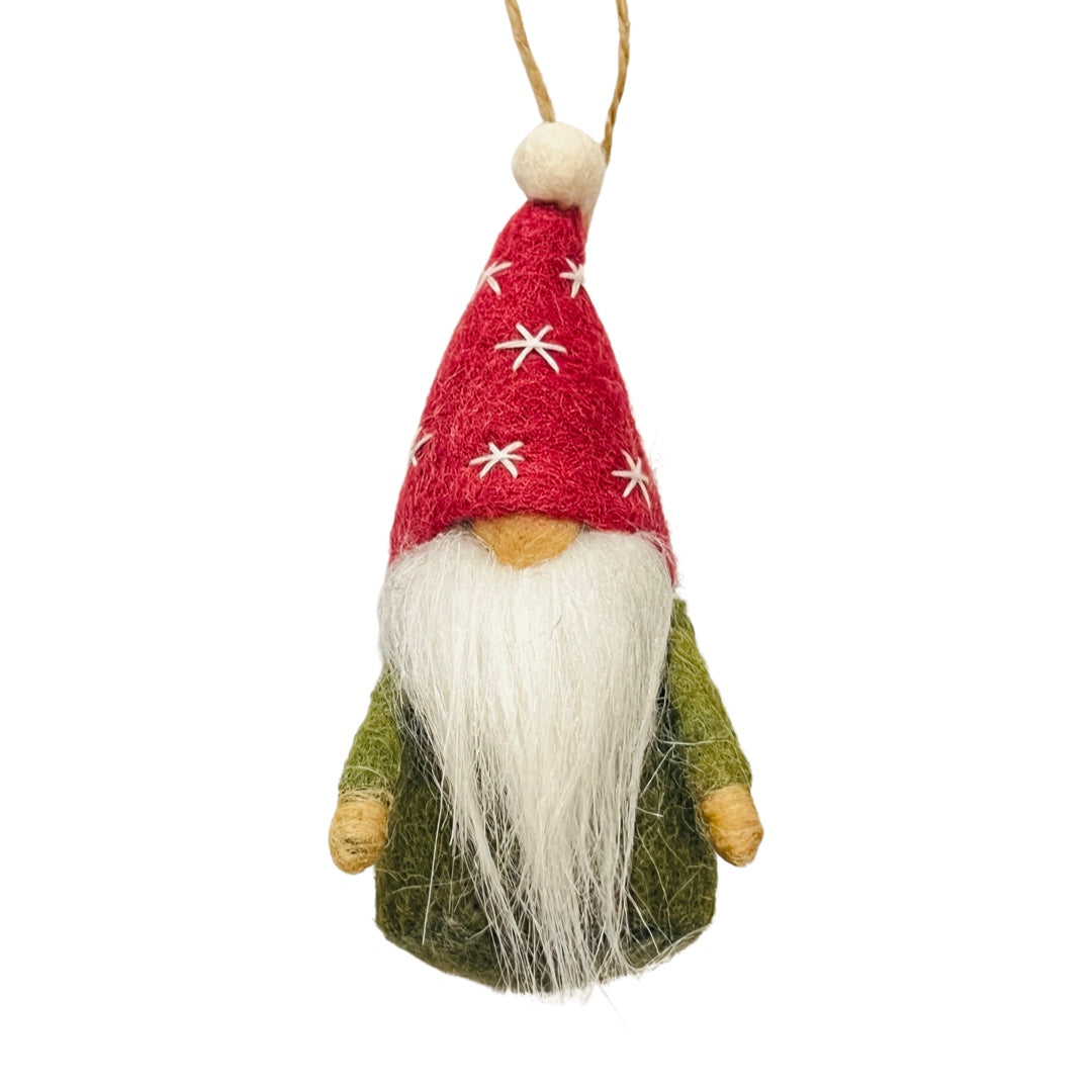 Felt gnome ornament wearing a green outfit and red hat with white stars.