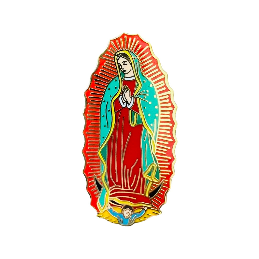 An enamel pin of the Virgin Mary with gold accents.