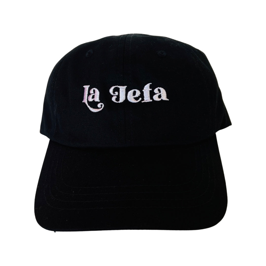 Black dad hat with the phrase La Jefa in white lettering