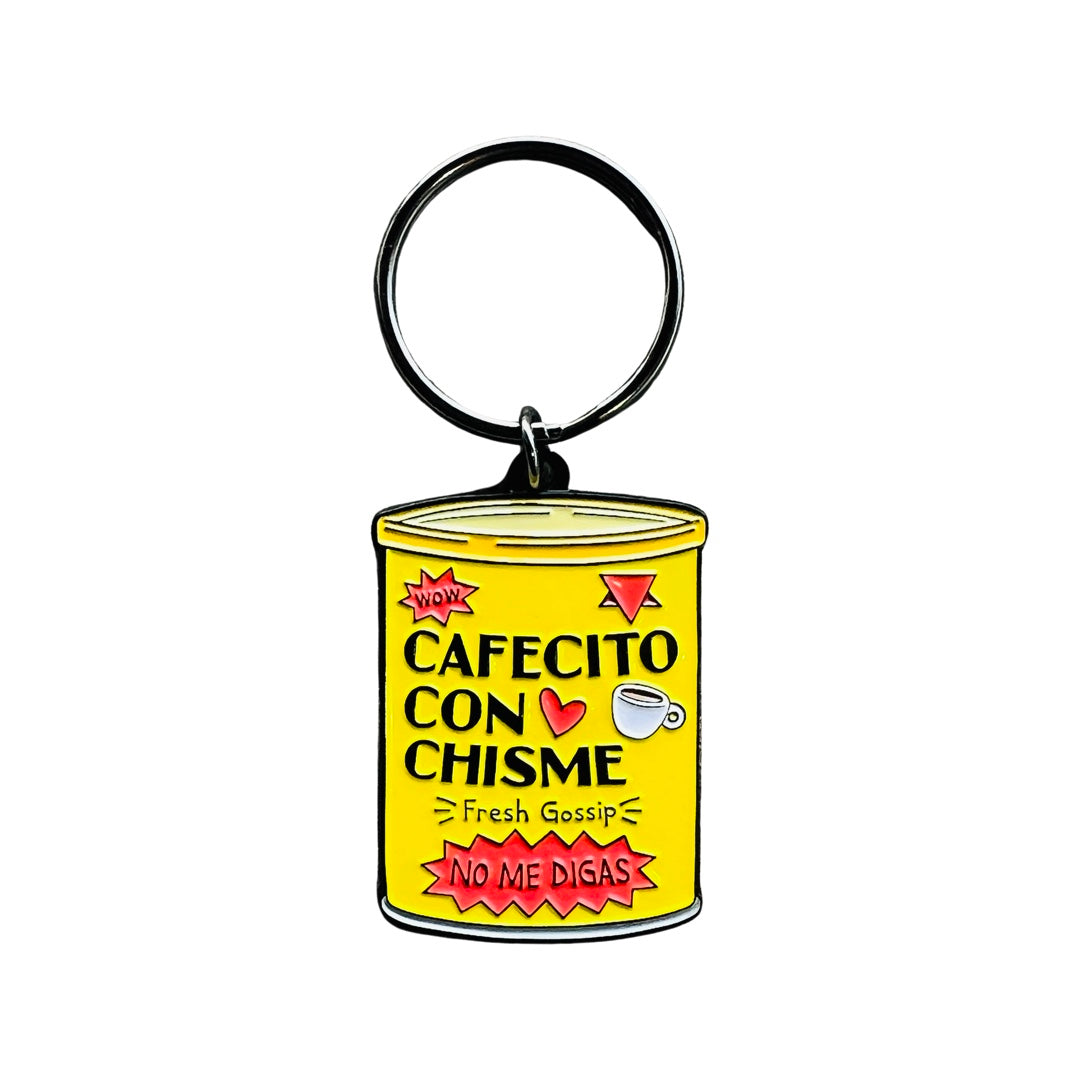Yellow enamel coffee can keychain that features the phrase Cafecito Con Chisme. Translation: Coffee with Gossip.