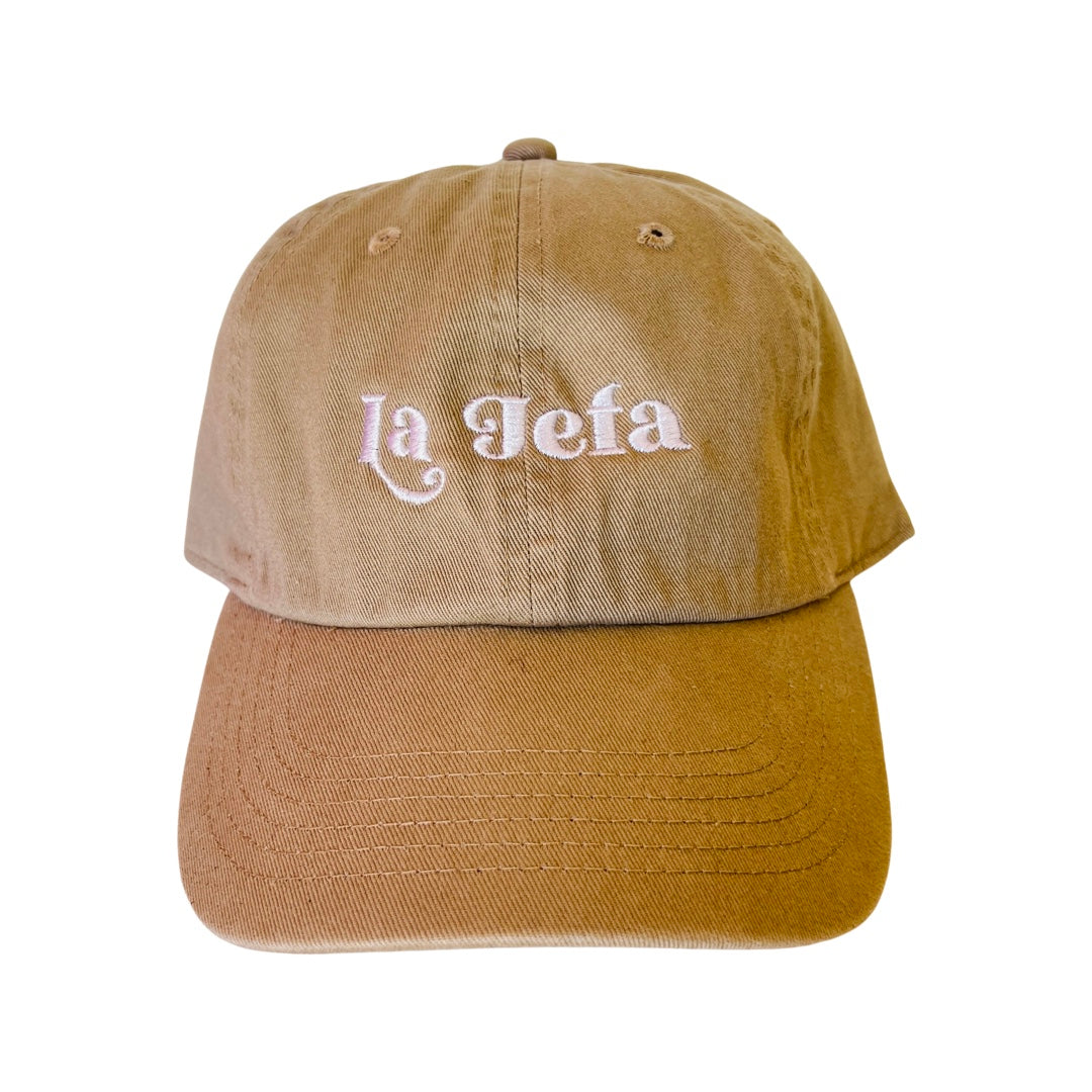 Khaki  dad hat with the phrase La Jefa in white lettering