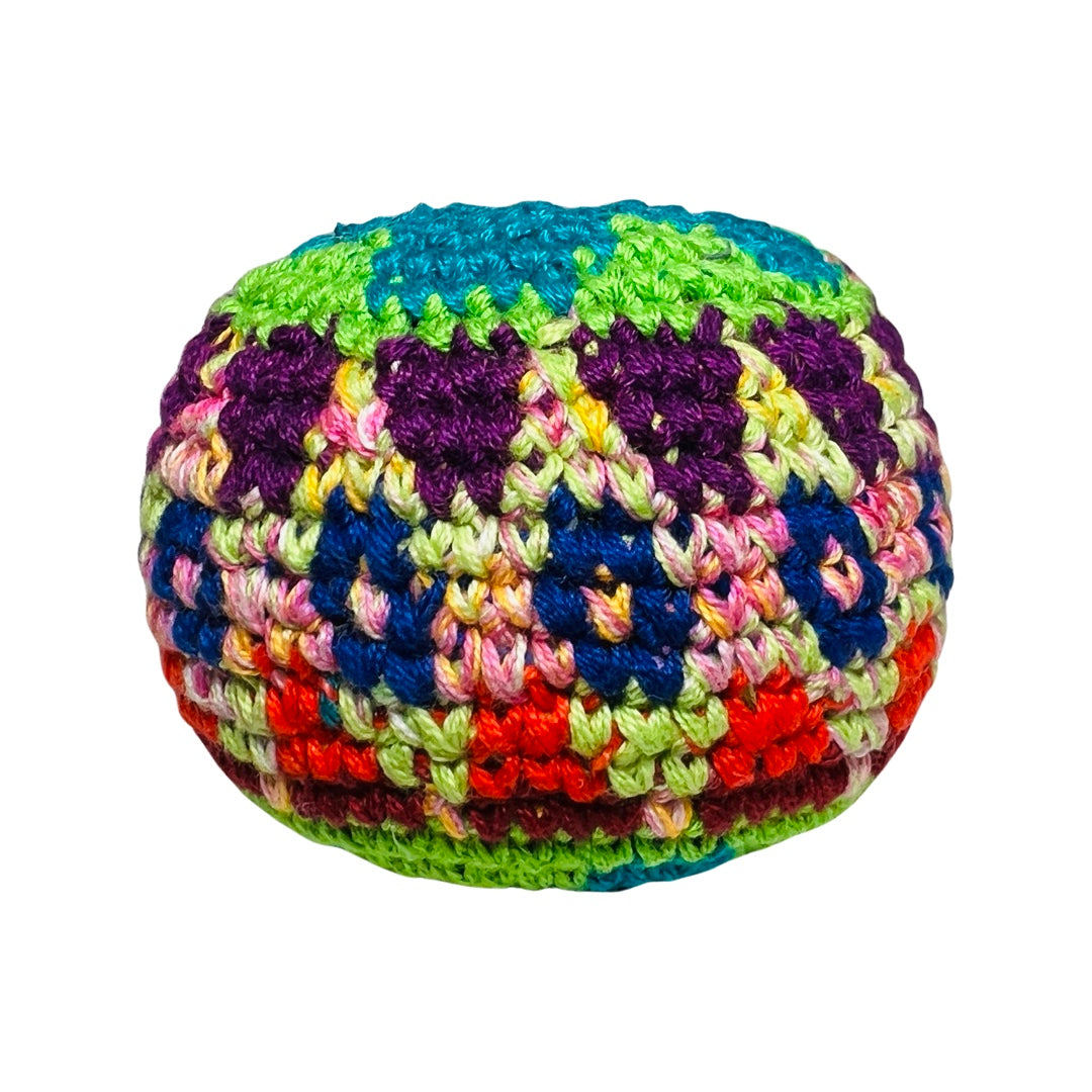 Round multi-colored handwoven hacky sack.