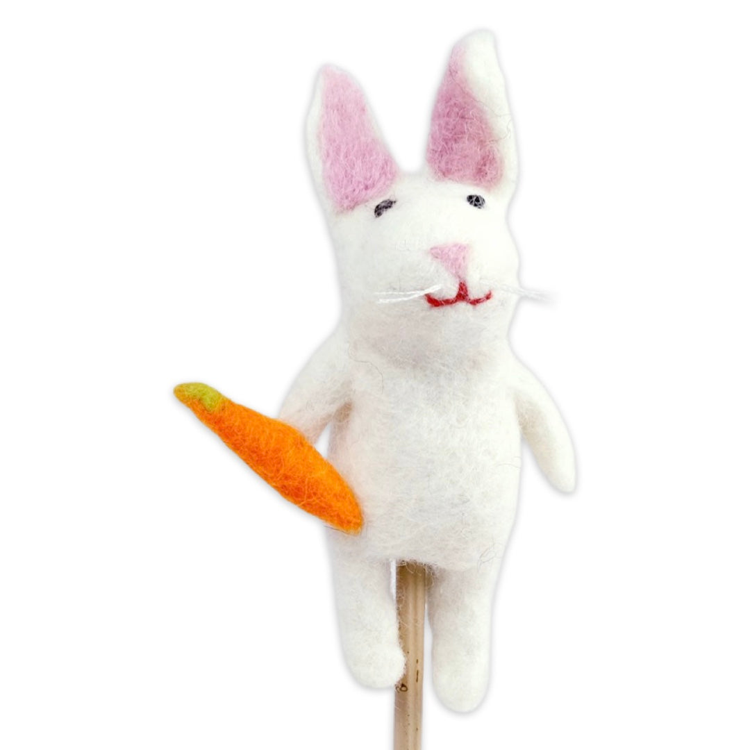 White felt bunny pencil topper with a carrot.