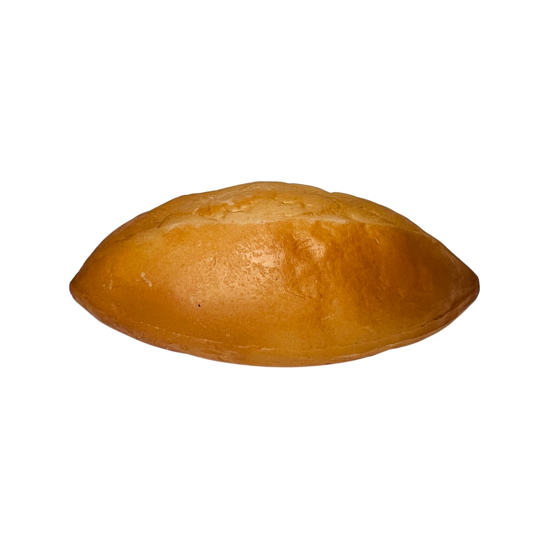 A realistic looking bolillo, Mexican bread, made of rubber.
