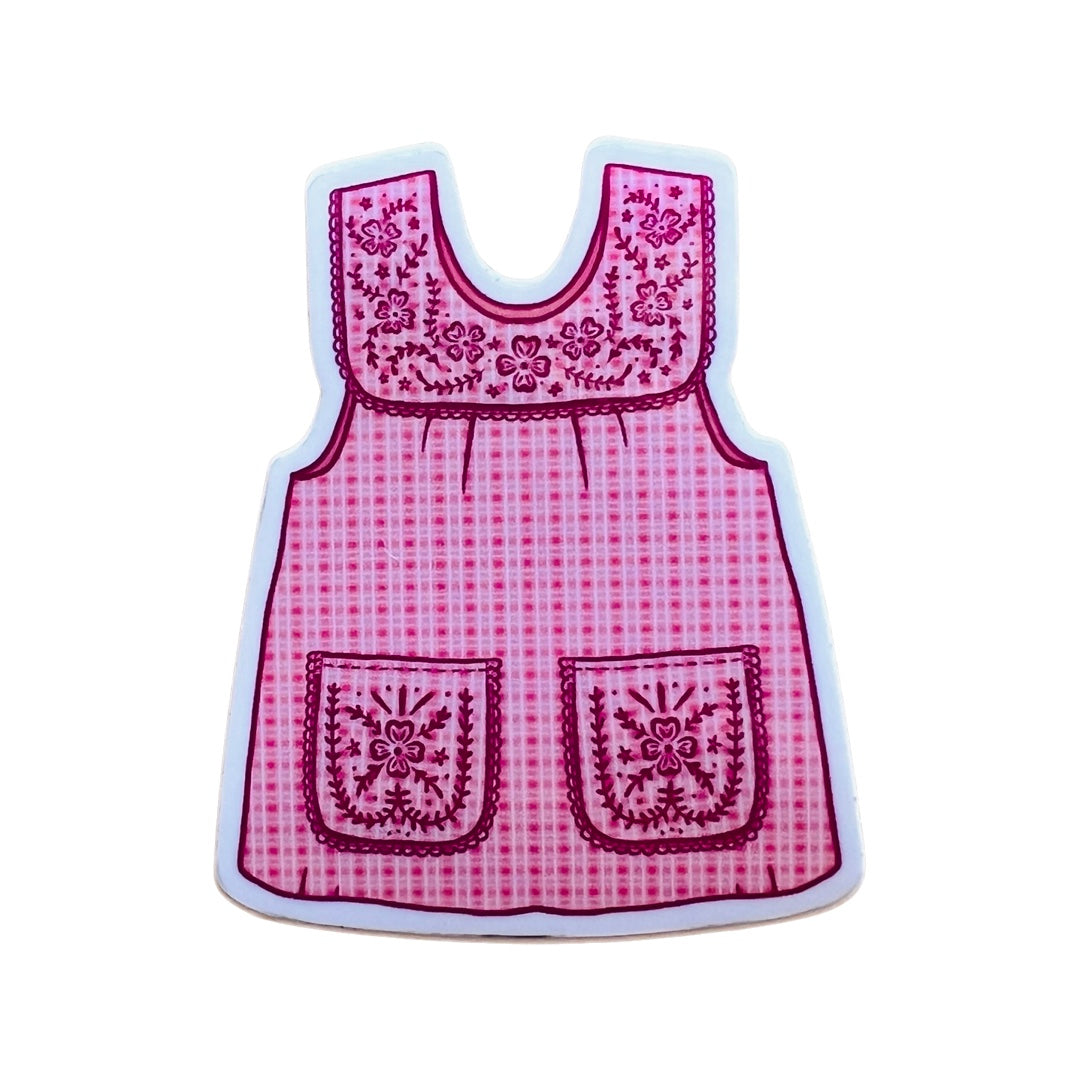 Vinyl sticker of a pink traditional Mexican apron called a mandil.