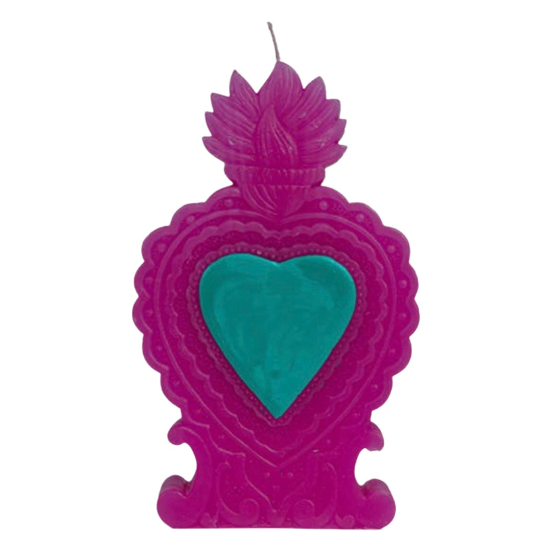 Purple milagro heart candle with the center painted turquoise.