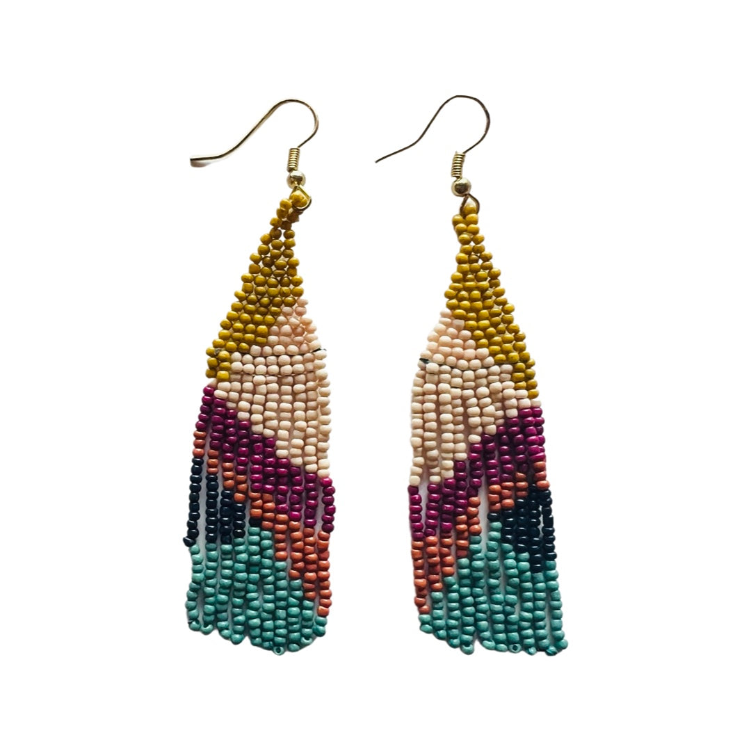 A pair of seed bead dangle earrings featuring a diamond design in the colors gold, peach, maroon, sienna, dark teal and teal.