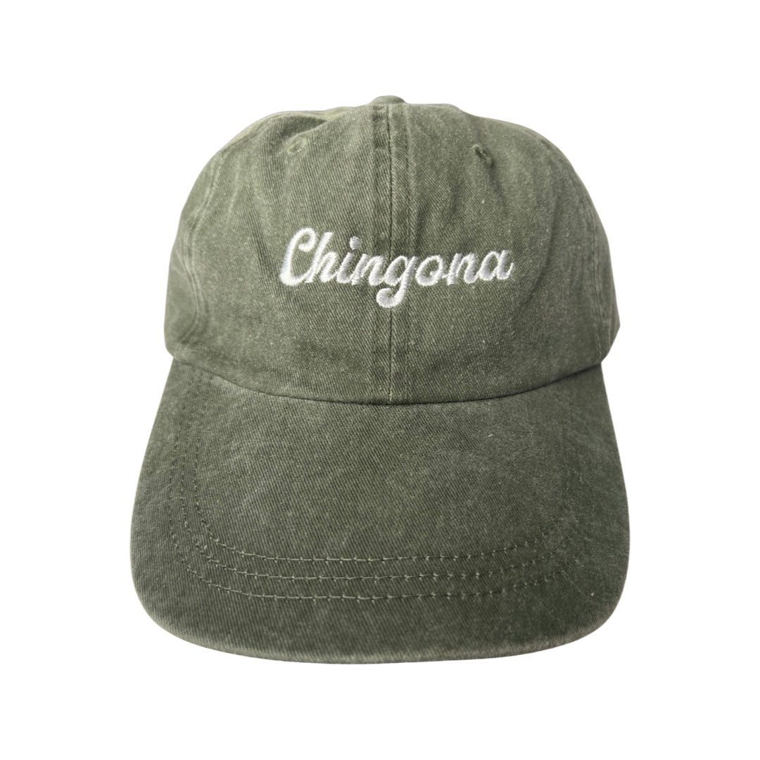 Olive canvas hat with the phrase Chingona in white embroidered lettering.